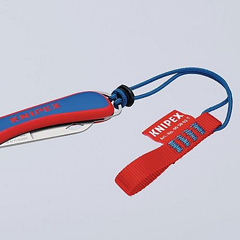 Couteau de poche avec manche rouge et bleu et boucle rouge avec inscription KNIPEX. Corde bleue reliant le couteau et la boucle.