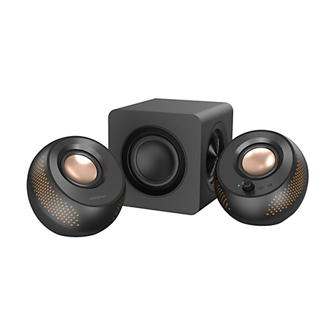 Schwarzes 2.1-Lautsprechersystem mit Subwoofer. Zwei kugelförmige Satellitenlautsprecher, Subwoofer in Würfelform, goldenene Membranen.