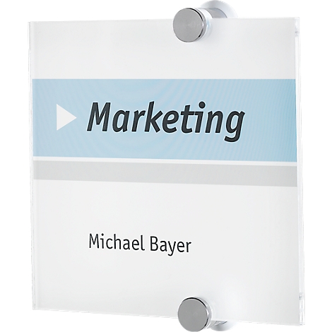 A rectangular sign with the word "Marketing" and the name "Michael Bayer" in black on a white background, with silver mounts.