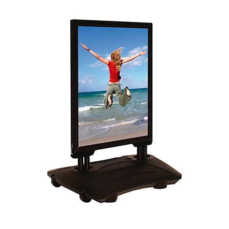 Signboard showing a person jumping on a beach.