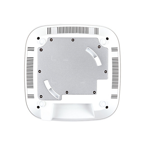 Vue de dessus du dessous d'un appareil électronique blanc avec des fentes de ventilation, une plaque argentée et des vis.