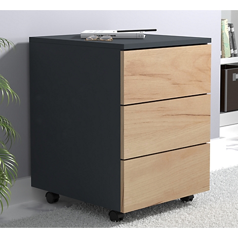 Black file cabinet with three drawers and wooden fronts. It is on wheels, with glasses and a remote control on top.