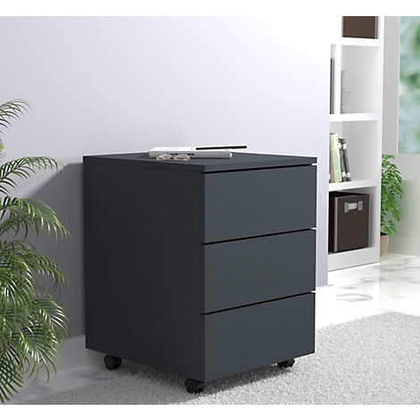 Dark gray filing cabinet with three drawers on wheels. Pens and glasses lie on top.