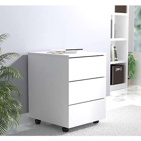 White three-drawer filing cabinet on wheels. Pens and notes on top. Background shelf and houseplant.