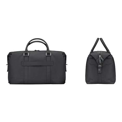 Zwei schwarze Reisetaschen, eine von vorne, eine von der Seite abgebildet. Mit Tragegriffen, Reißverschlüssen und Metallbeschlägen.