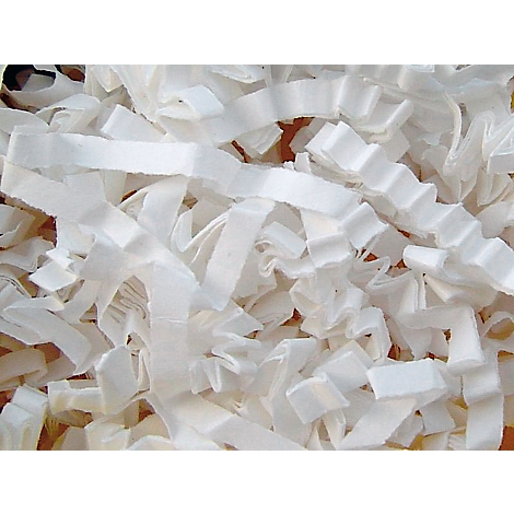 Close-up of crumpled, white paper strips. The paper strips overlap, creating an interesting pattern.