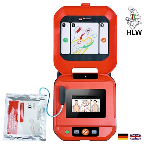 Rotes Defibrillatorgerät mit Display, Anleitung, Elektroden-Packung und Flaggen.