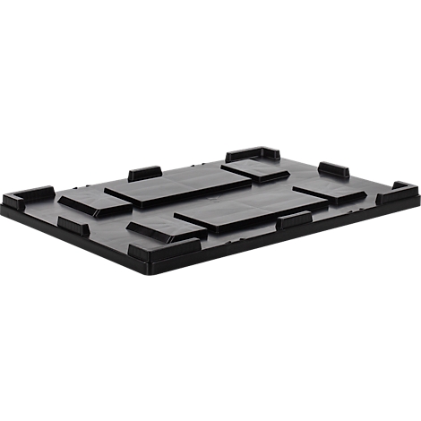 Zwarte kunststof plaat met verhogingen en uitsparingen, lichte perspectief.