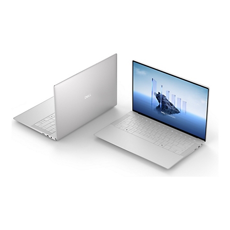 Zwei silberne Laptops, einer geöffnet, einer geschlossen. Geöffnet: Bildschirm mit Landschaft und Text, Tastatur sichtbar. Auf dem Deckel „DELL“.