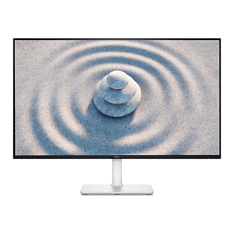 Un moniteur Dell sur fond blanc. L'écran affiche une pile de pierres sur du sable avec un motif de vagues.