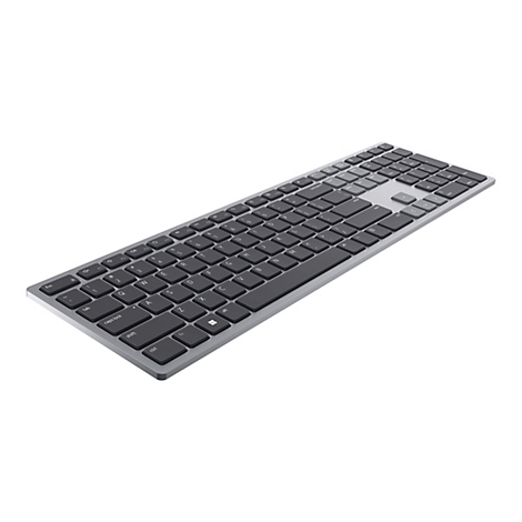 Vue de dessus d'un clavier argenté avec des touches noires. Le clavier est sur un fond blanc.