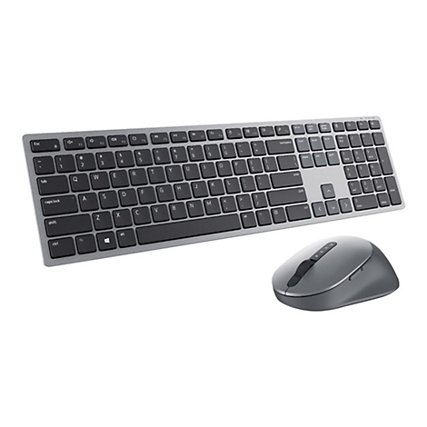 Clavier et souris sans fil gris sur fond blanc. Le clavier a des touches noires. La souris a une molette.