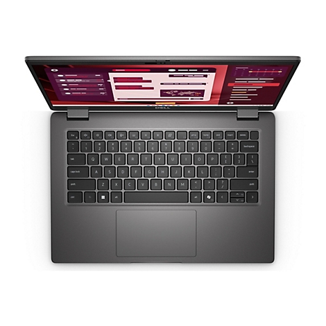 Draufsicht auf einen geöffneten, grauen Laptop mit schwarzer Tastatur und Anzeige einer Website. Die Marke DELL ist deutlich zu sehen.