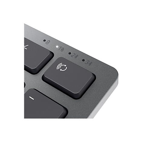Gros plan sur un clavier d'ordinateur avec les touches 1, 2 et 3 pour les connexions et Bluetooth. Le gris et le noir dominent.