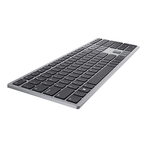 Clavier gris avec touches noires, en léger angle sur fond blanc.