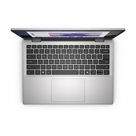 Draufsicht auf ein geöffnetes silbernes Notebook mit schwarzer Tastatur und einem Display, auf dem eine Website zu sehen ist. Der Touchpad-Bereich ist deutlich sichtbar.