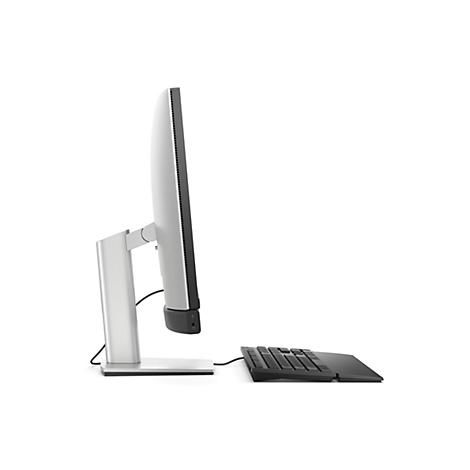 Seitenansicht eines schlanken, silbernen Monitors mit schwarzer Tastatur auf weißem Hintergrund.