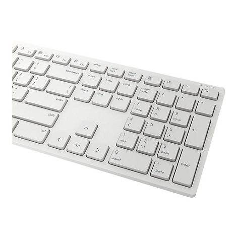 Ein weiÃŸes Keyboard aus der Vogelperspektive. Das Keyboard ist in verschiedene Tastenbereiche unterteilt, mit Buchstaben, Zahlen und Sondertasten.