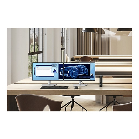 Ein Doppelmonitor mit CAD-Anwendung und E-Mail-Anwendung steht auf einem Schreibtisch im Büro. Maus und Tastatur sind vorhanden.