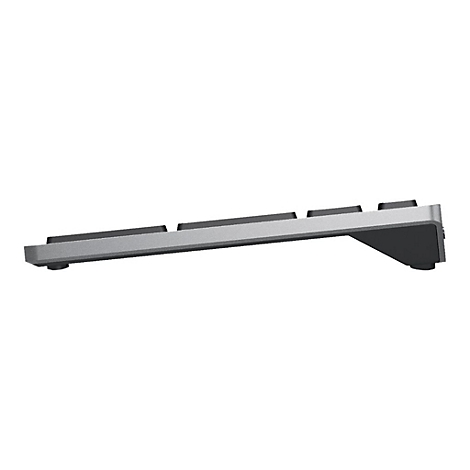 Seitenansicht einer flachen, silbernen Tastatur, mit schwarzen Tasten und einem schwarzen Rahmen.