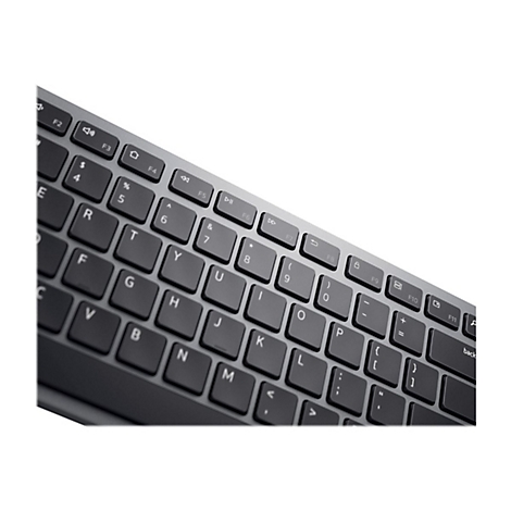 Nahaufnahme einer anthrazitfarbenen Tastatur mit Tasten in Schwarz und Buchstaben in WeiÃŸ. Der Hintergrund ist weiÃŸ.