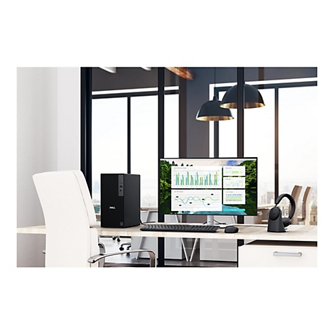 Bureau avec PC Dell, moniteur avec graphiques, clavier, souris et casque. Fenêtres et lampes sont visibles à l'arrière-plan.