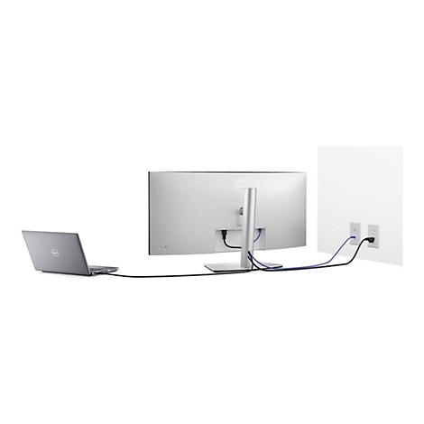 Rückansicht eines Dell Monitors und Laptops, verbunden mit Kabeln an einer weißen Wand.