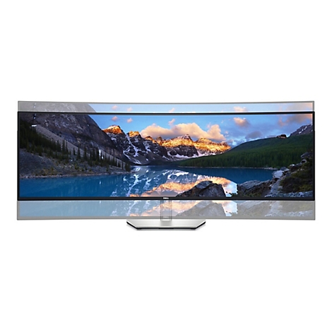 Gebogener Dell Monitor mit Gebirgslandschaft. Flacher, silberner Standfuß. Schwarzer Rahmen, blaues Display.