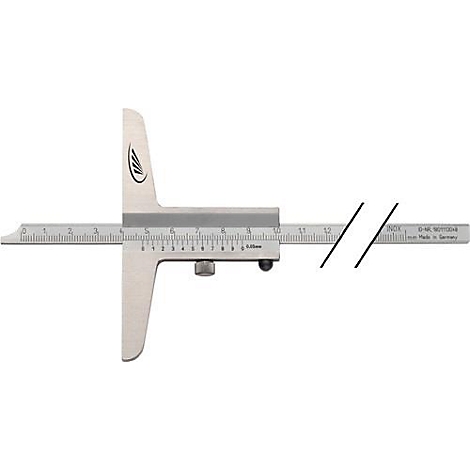 A silver depth gauge with a scale and a logo on the measuring tongue. Part of the scale is broken.