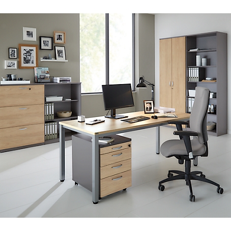 A modern office space with desk, cabinet wall, and chair, arranged in a bright, friendly atmosphere.