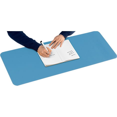 Person writing in a notebook on a blue surface. The pen is touching the paper. A list can be seen on the right page.