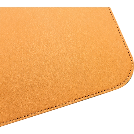 Close-up of an orange leather product, with a rounded corner and decorative stitching.