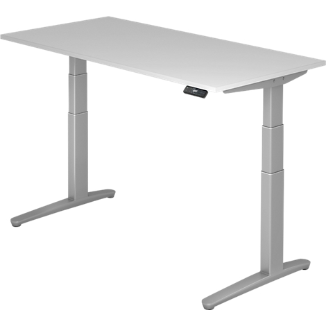 A white, height-adjustable desk with two grey legs. There is a black control panel on the tabletop.