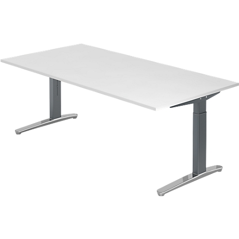 A rectangular white desk with height-adjustable gray legs. The tabletop is smooth and even.