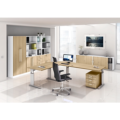 Modern office with corner desk, office chair, and cabinets. On the desk: monitor, cup, etc. Bright colors.