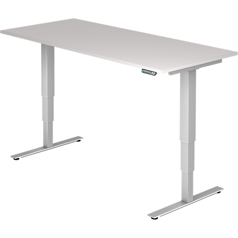 A white, height-adjustable desk. The table top is rectangular. There are controls on the side.
