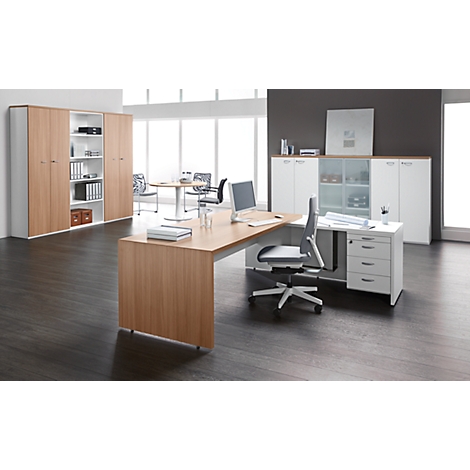 Office with desk, chair, cabinets and round table. Wood and white furniture, dark floor, large windows.