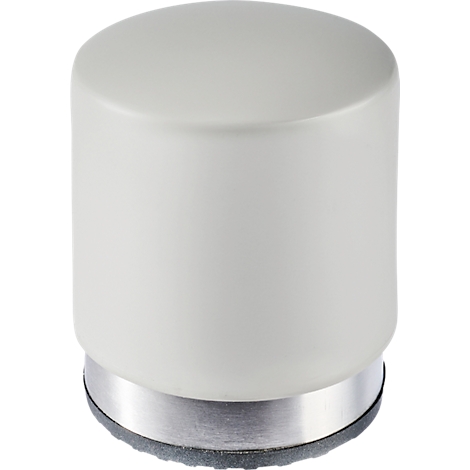 Cilindrisch, crèmekleurig object. Zilveren ring aan de onderkant en zwarte basis.