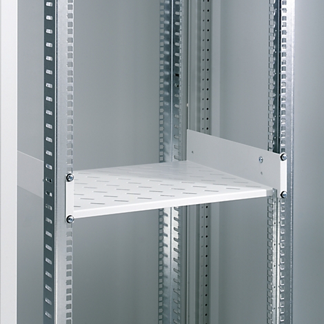 Close-up of a white shelf in a steel cabinet. The shelf has a perforated surface.
