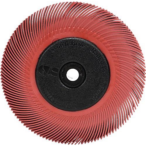 Brosse radiale rouge, circulaire avec centre noir, lettrage. Un trou au milieu.