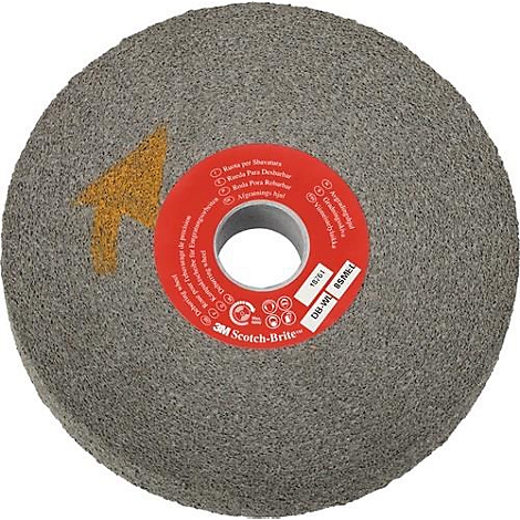 Disque de meulage gris avec étiquette rouge et flèche jaune.
