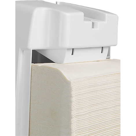 Distributeur de serviettes en papier blanc avec serviettes en papier. Le papier est bien empilé et clairement visible.