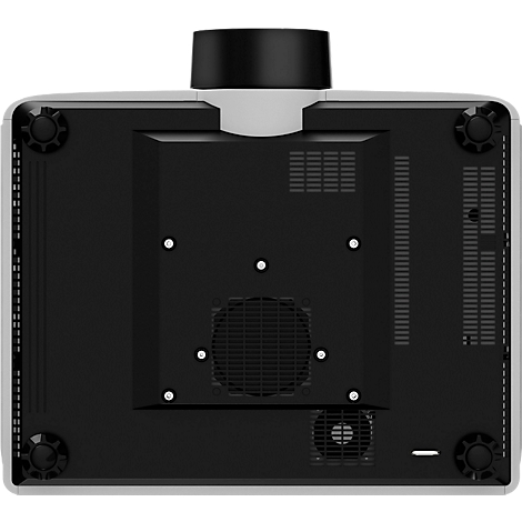 Underside view of a projector with black underside, ventilation grilles and adjustment feet. Black lens tube.