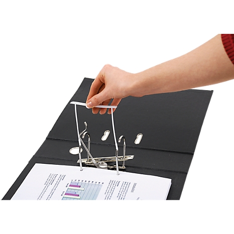 A hand opens a black binder. The locking mechanism is being operated.