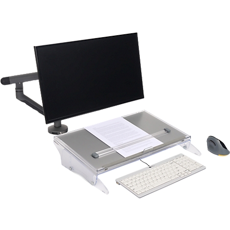 A desk setup with monitor, document holder, keyboard, and mouse. The setup is designed for an ergonomic workspace.