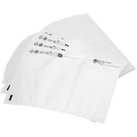 A stack of white plastic bags fanned out against a neutral backdrop. The bags feature black symbols and text.