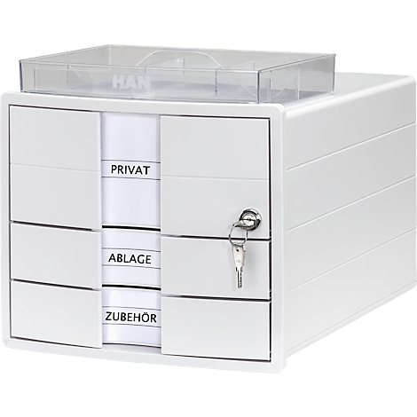 White drawer cabinet with key and labels: Private, Filing, Accessories. On top a transparent tray.