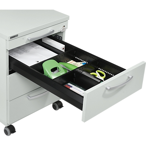 Drawer cabinet with open drawer. Papers, punch, scissors, pens, and ruler are in the black compartments.