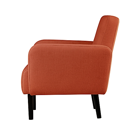 Zijaanzicht van een oranje fauteuil. Zwarte poten, hoge rugleuning, armleuningen.