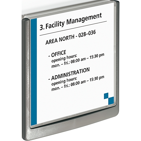 Rectangular sign with silver frame, blue stripe, and white background. Text: Facility Management, office and administration opening hours.